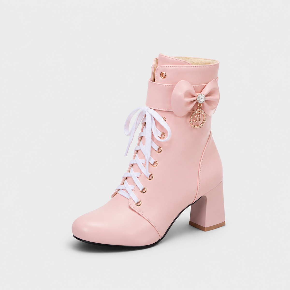 Bottines à la cheville avec lacets et sangle réglable
