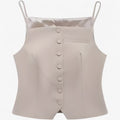 Top Corscon con tirantes finos estilo minimalista