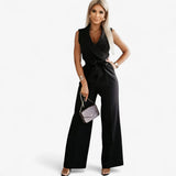 Elegante zwarte dames jumpsuit met wijde broek, mouwloos en met riem