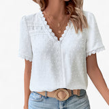 Vintage katoenen blouse met kanten details en ballonmouwen in blauw