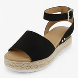 Veelzijdige dames espadrilles sandalen van beige canvas met comfortabele sleehak