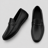 Heren mocassins van leer met donkerbruin slangenmotief