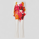Elegante bloemenoutfit voor dames met blote schouders en wijde pijpen - levendige print, vloeiende pasvorm