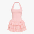Vestido de verano asimétrico con cuello halter y borde desflecado Mujer