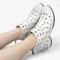 Botines para mujer negros en piel auténtica transpirable con tacón y cremallera – Elegantes y cómodos