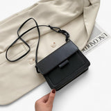 Trendy damestas met schouderriem