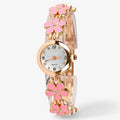 Reloj de pulsera analógico de cuarzo con flores y galletas para mujer