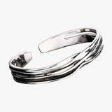 Gevlochten zilveren armband met retro stijl voor dames