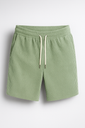 Pantalones cortos casuales de terciopelo con cordón de piel para hombre