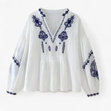 Boho blouse met marineblauwe borduursels, luchtige pasvorm voor dames