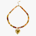 Collar de cuentas impermeable y colorido con corazón dorado Lana