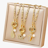 Ketting met vleugels en glinsterende schelpenbloemen Lana